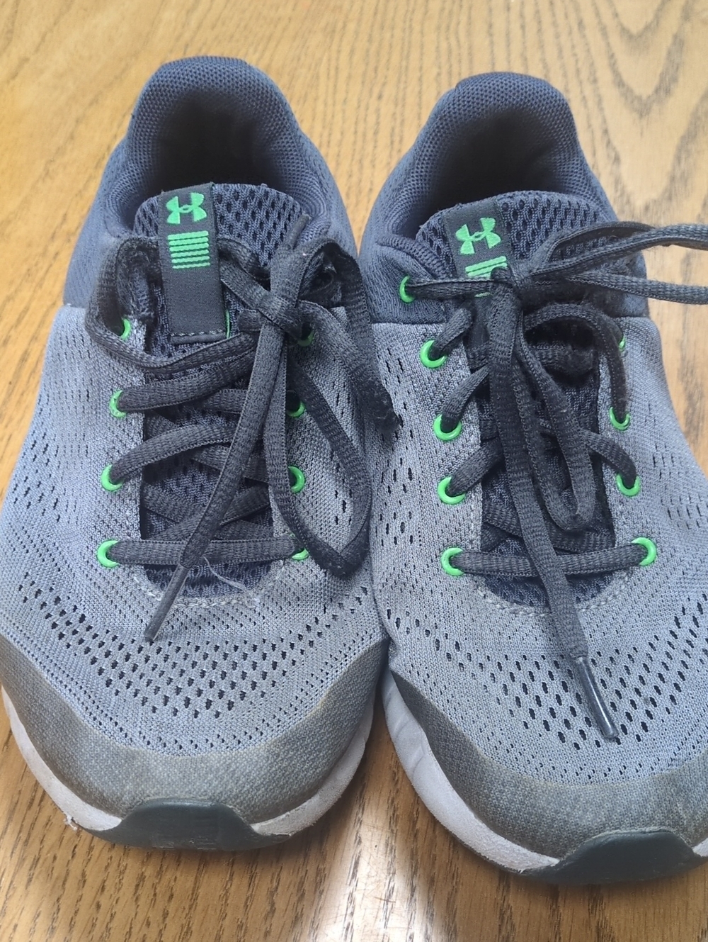 Under Armour Gray and Green Kids Sneakers with Green Accents